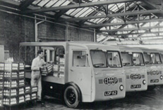 dairyland cuisine photo of our delivery trucks and driver from fifty years ago.